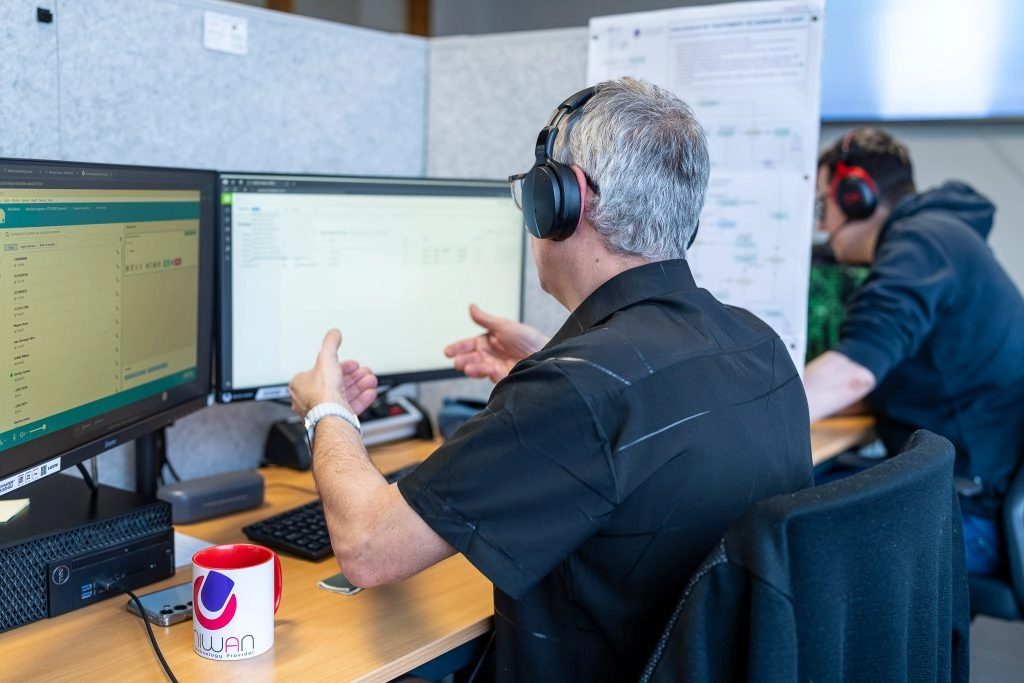 Employé discutant avec un client - MSP (managed service provider)